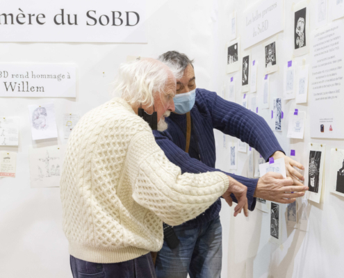 Willem choisissant les gravures du SoBD